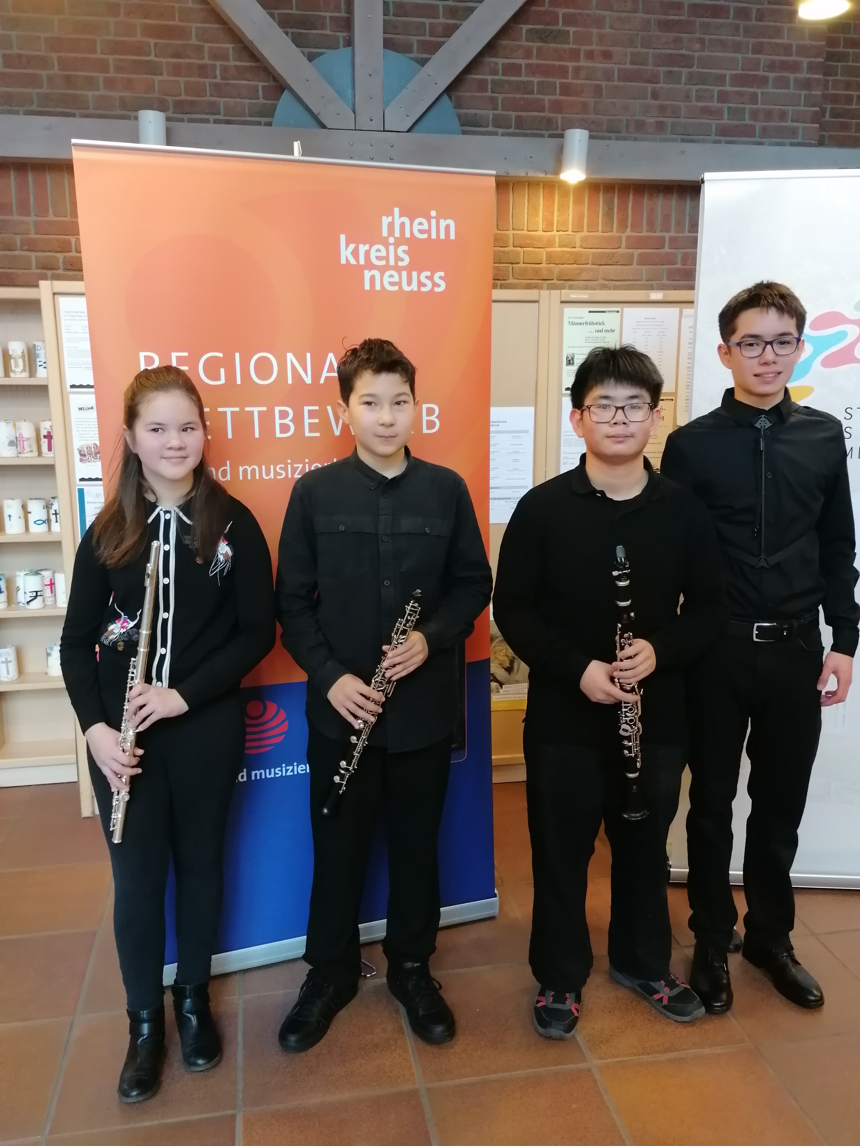 Vier Preisträger*innen: Lavina Cai-Stanley, Leo Maximilian Becker, Hongzuhou Le und Jan Heidlauf