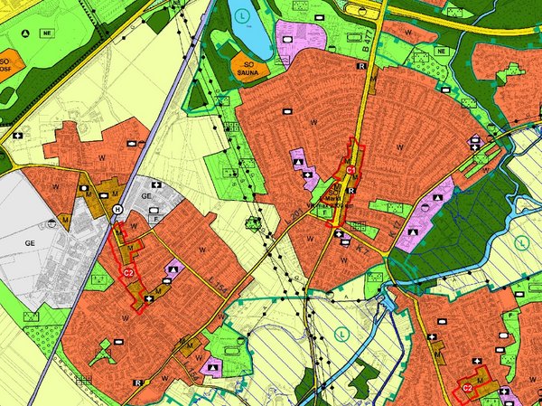 Ein farbiger Plan mit verschiedenen Nutzungszonen für Landnutzung, u.a. für Gewerbe-, Wohn- und Erholungsgebiete.