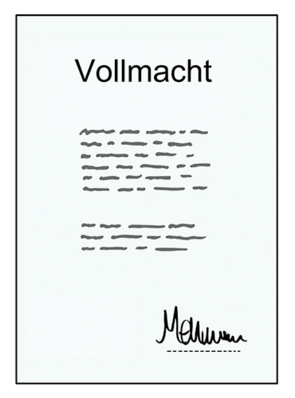 Papier mit der Aufschrift Vollmacht, Text und Unterschrift.