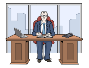 Der Chef sitzt im Büro am Schreibtisch.