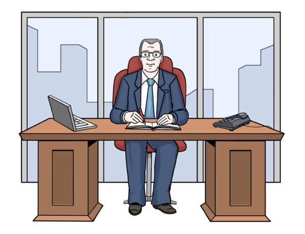 Der Chef sitzt im Büro am Schreibtisch.