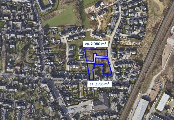 Luftaufnahme des Gebiets mit zwei markierten Gebietsgrenzen und jeweils eingezeichneter Fläche (2.080 m² und 2.735 m²).