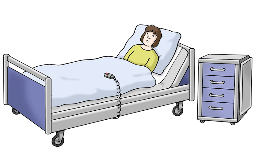 Eine Frau liegt im Kranken-Bett.